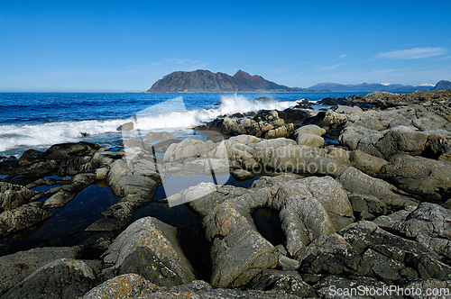 Image of Breathtaking coastal landscape of Norway featuring rugged rocks 