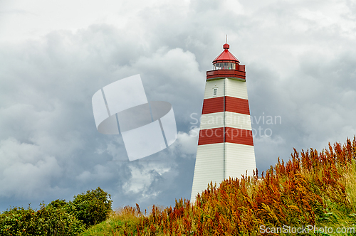 Image of Discovering the Majestic Lighthouse on the Rugged Coast of Norwa