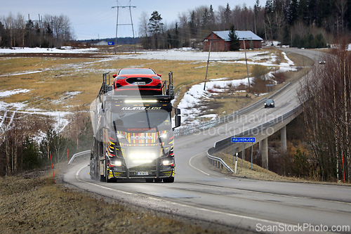 Image of Road Landscape with Unique Scania R650 Vehicle Carrier