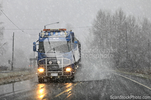 Image of Scania Truck on Road in Bad Weather