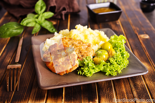 Image of chicken cutlet from minced meat with mashed potato
