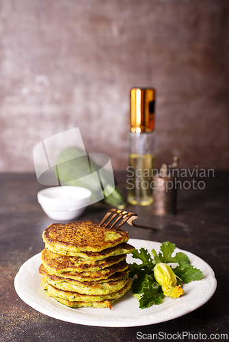 Image of Zucchini Fritters with Herbs and Cream Cheese Topping, Tasty Vegetable Pancakes