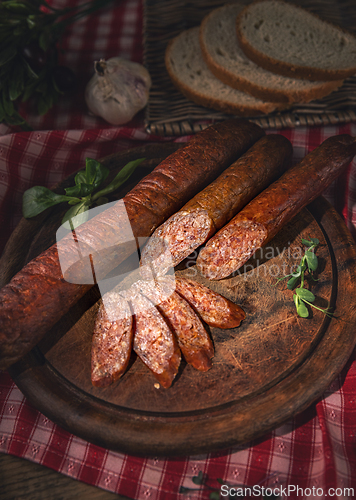 Image of Traditional homemade sausages seasoned with herbs