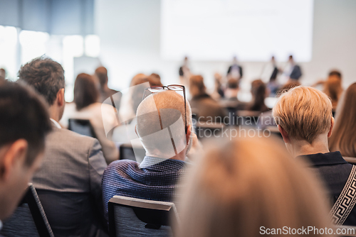 Image of Interview and round table discussion at business convention and presentation. Audience at the conference hall. Business and entrepreneurship symposium