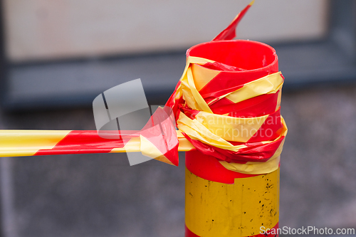 Image of Yellow and red barrier tape