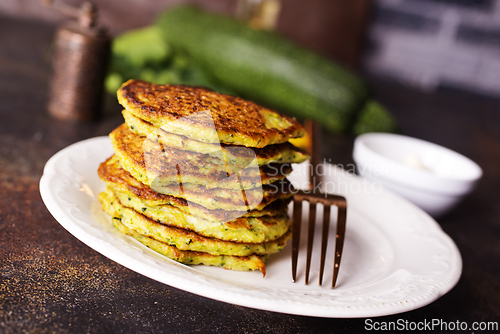Image of Zucchini Fritters with Herbs and Cream Cheese Topping, Tasty Vegetable Pancakes