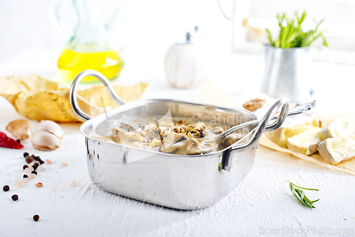 Image of Mushroom sauce in metal bowl