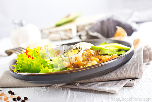 Image of Rice bowl with shrimps and avocado