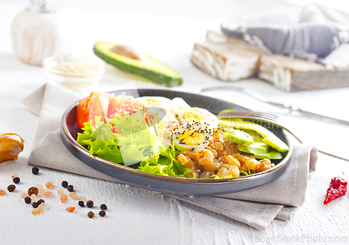 Image of Rice bowl with shrimps and avocado