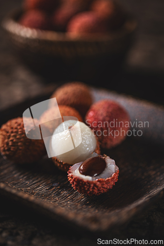 Image of Fresh lychees showing white flesh