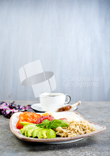 Image of Healthy breakfast. oat flakes with avocado