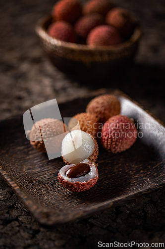 Image of Ripe lychees with their textured skin