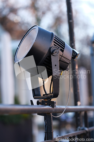 Image of A spotlight on a fence