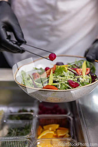 Image of Chef adding final touches