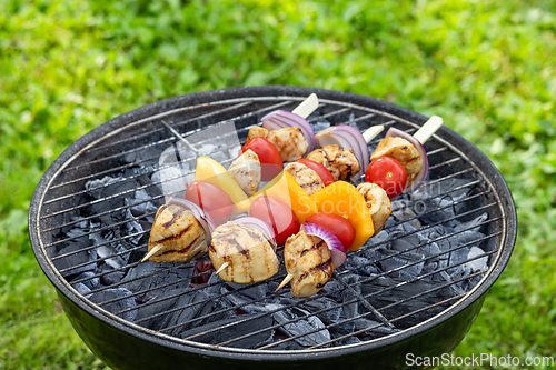 Image of grilled chicken and vegetable skewers
