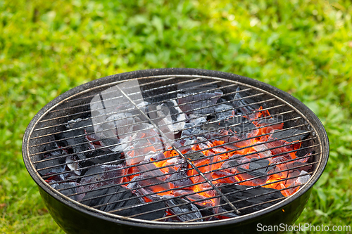 Image of empty burning grill