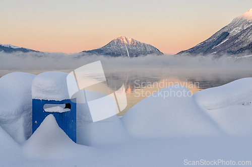Image of Majestic winter landscape of Norway featuring tranquil waters an