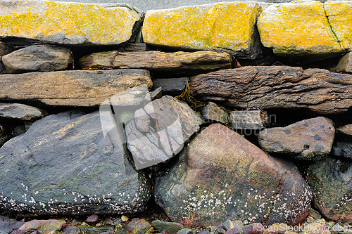 Image of Exploring the ancient textures of Norway's coastal stone walls o