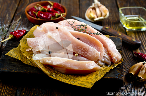 Image of raw chicken meat, chicken fillet with spice