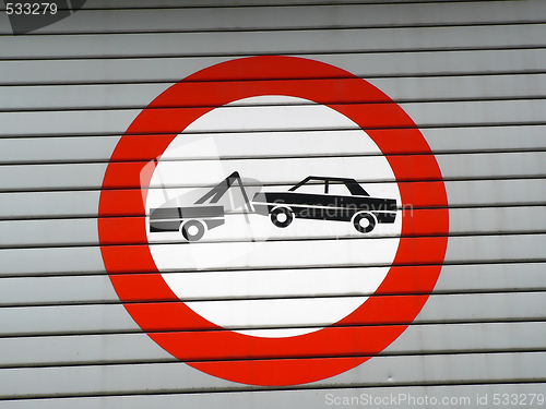 Image of car towing sign