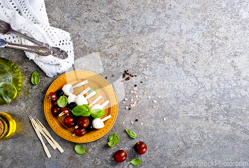 Image of A plate with Italian salad caprese canape