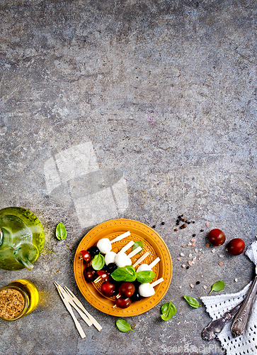 Image of A plate with Italian salad caprese canape