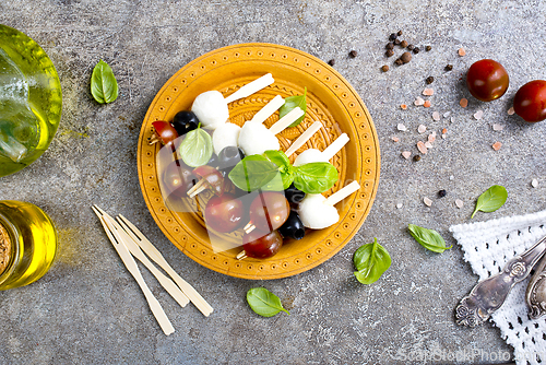Image of A plate with Italian salad caprese canape