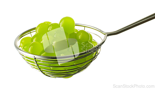 Image of green jelly balls for making bubble tea