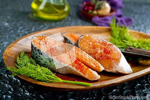 Image of Fresh raw salmon steak with spices. Healthy seafood food
