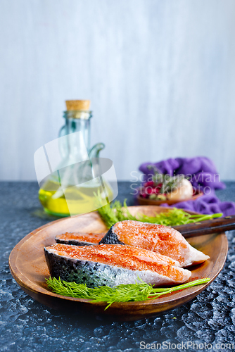 Image of Fresh raw salmon steak with spices. Healthy seafood food