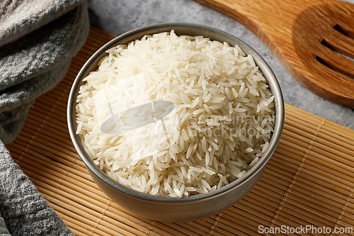 Image of bowl of uncooked rice