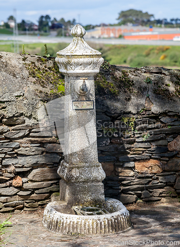 Image of Decorative drinking fountain in a small town in Spain