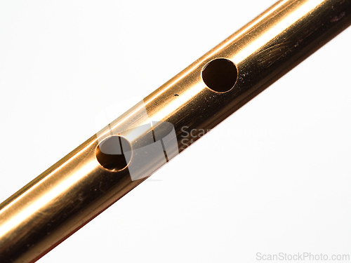 Image of Holes on a tin whistle