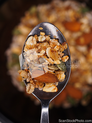 Image of Granola muesli on a spoon