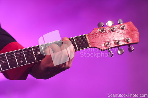 Image of Playing guitar