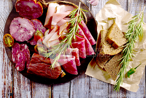 Image of Slices of delicious spanish sausage salam, smoked meat, sausages.