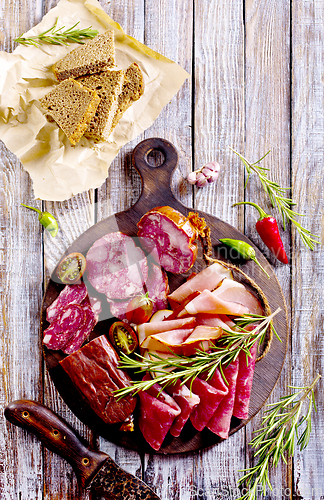Image of Slices of delicious spanish sausage salam, smoked meat, sausages.