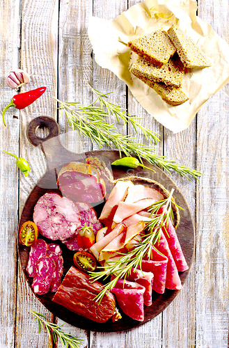 Image of Slices of delicious spanish sausage salam, smoked meat, sausages.
