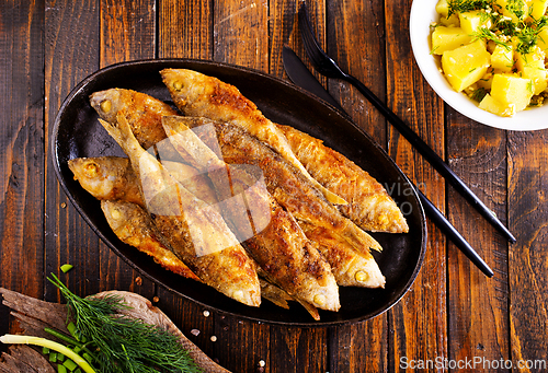 Image of Plate of fried fish, fried fish and potato