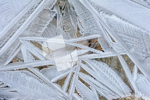 Image of Stunning frost patterns adorn the rocky surface in Norway's wint