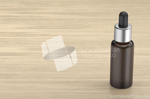 Image of Dropper bottle on wooden desk