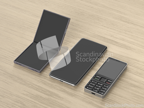 Image of Different types of mobile phones with blank displays