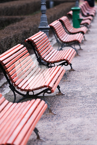 Image of Park benches in a row
