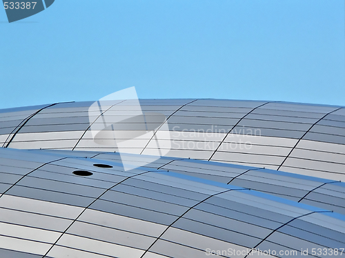 Image of Closeup of a glass building under clear sky