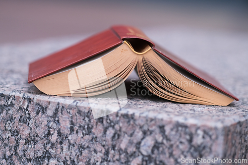 Image of Book on a stone table