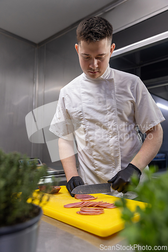 Image of Chef slicing fresh tuna