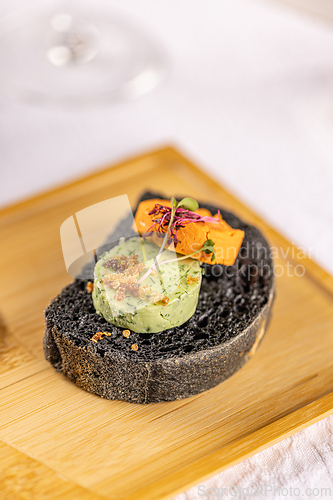Image of Gourmet black bread canapes