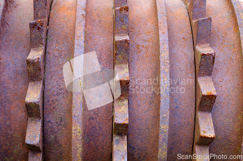 Image of Close-up view of rusted metal machinery showing detail of indust