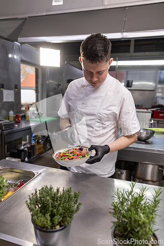 Image of Chef preparing a gourmet salad