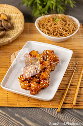 Image of Delicious sesame chicken with honey sauce